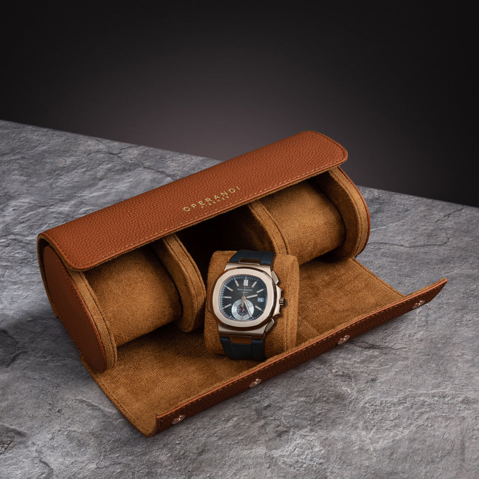Sella Marrone open with a black-dial watch in the center berth